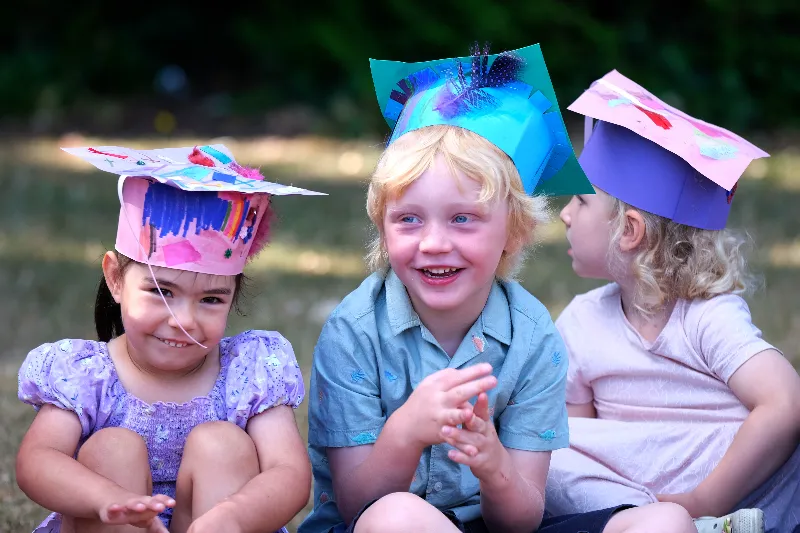 children wearing handmade hats